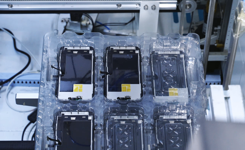 Batch of replacement displays organized for processing